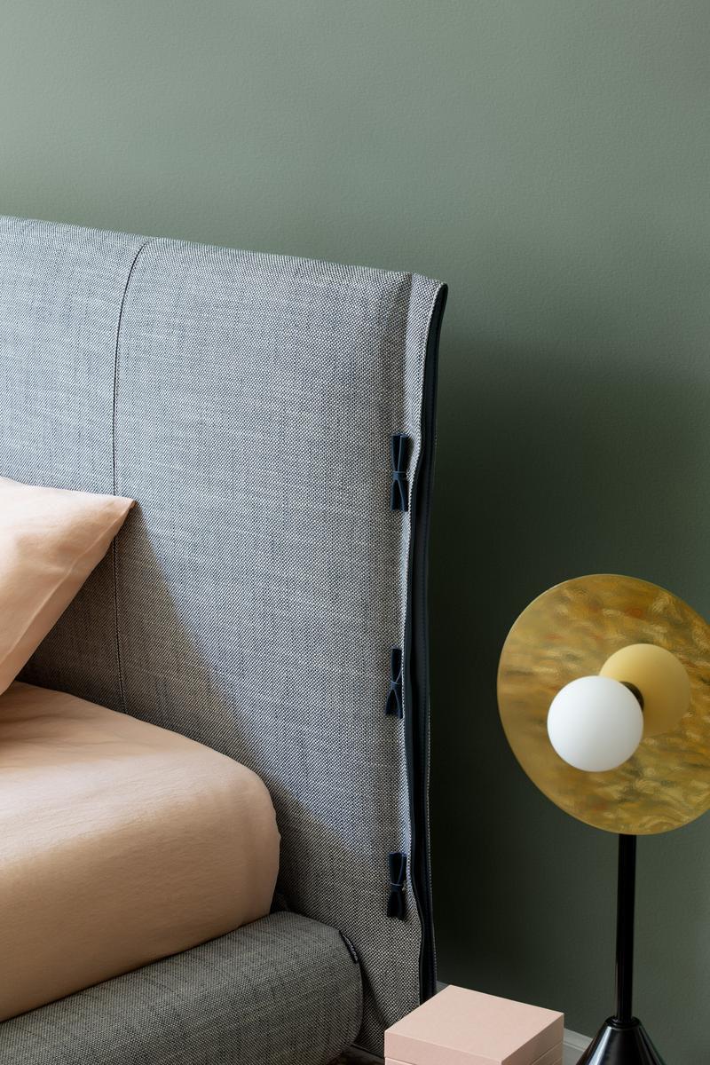 CUFF Single bed with upholstered headboard