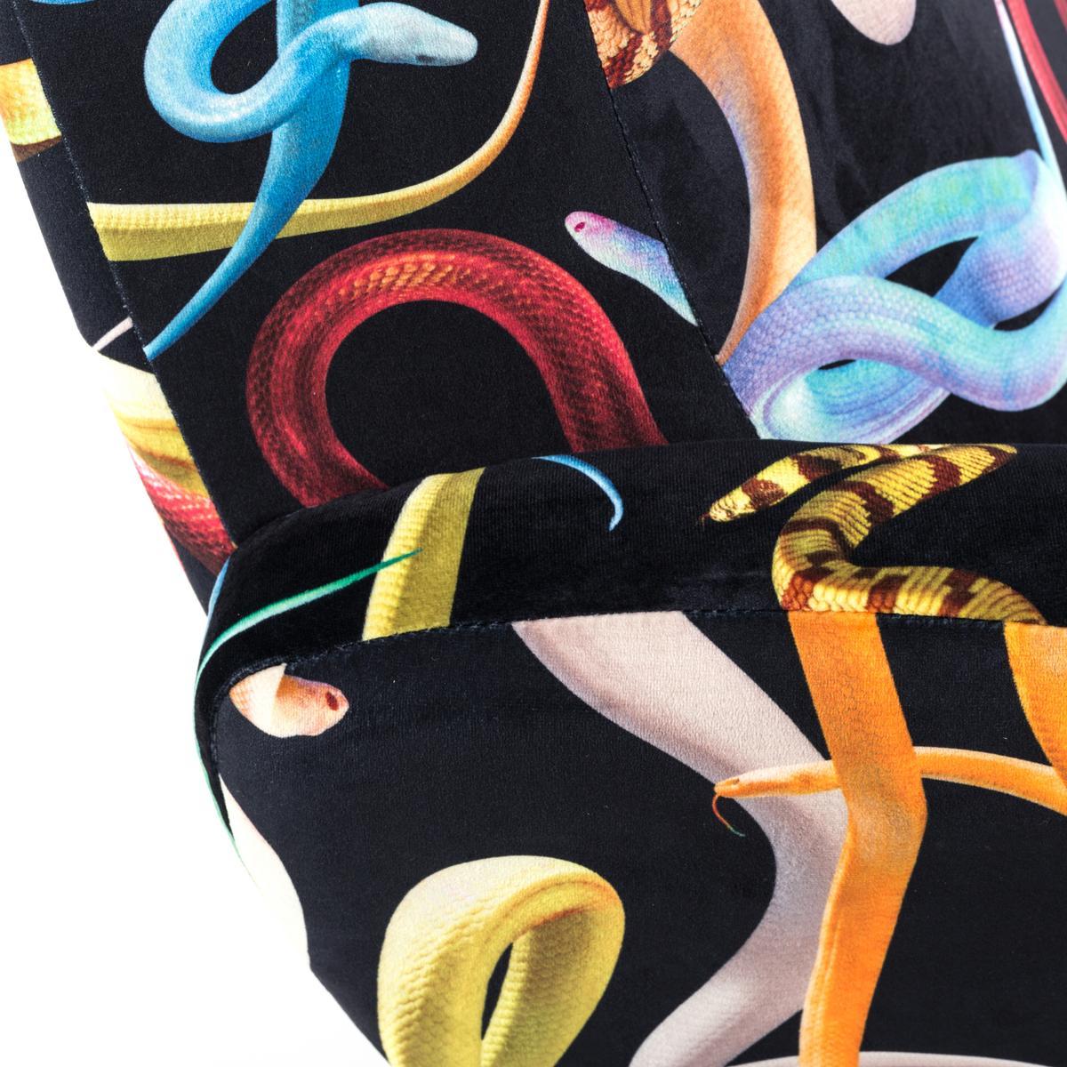 SNAKES Fabric armchair with armrests