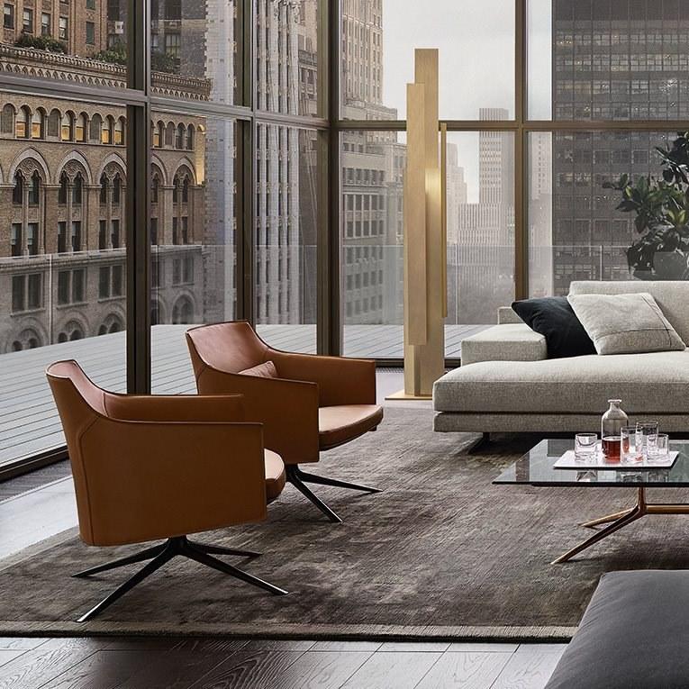 STANFORD Swivel tanned leather armchair with armrests