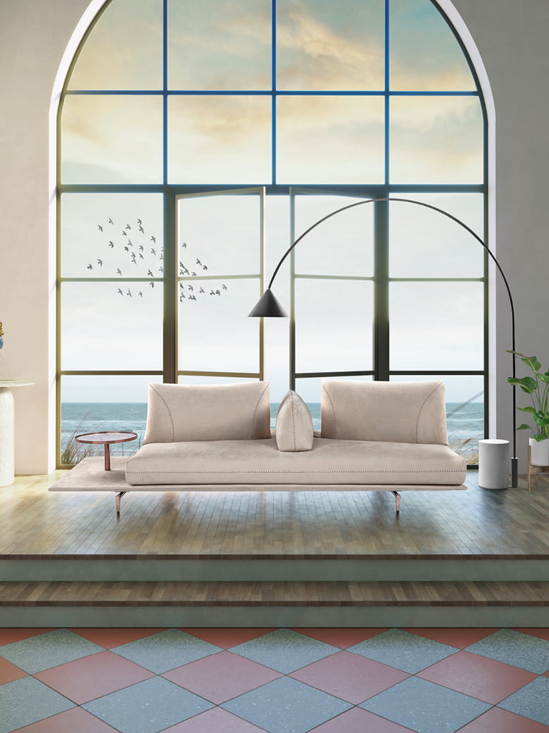 GIANDUIOTTO A versatile sofa offering adjustable backrests for multiple seating positions, elegant design stitching, and optional integrated table surfaces, elevated by stylish metal feet.