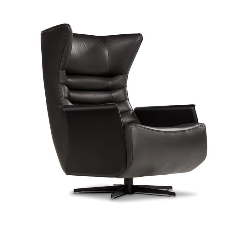 GERRIT The 'Gerrit' armchair is a comfortable, modern classic with quilting detail that extends to a matching footstool. Optional swivel base and customizable finishes cater to personal or office use.