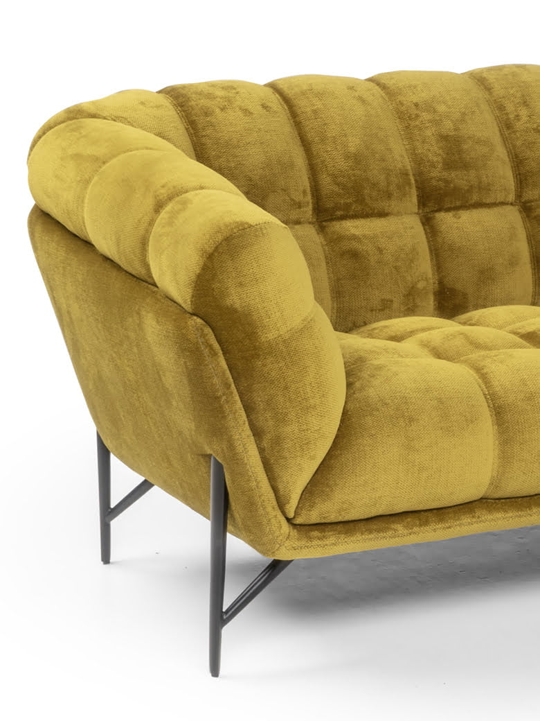 LIBERTY Contemporary Liberty sofa with sophisticated elegance, featuring soft, enveloping quilting and raised on sleek metal feet for an elevated aesthetic.