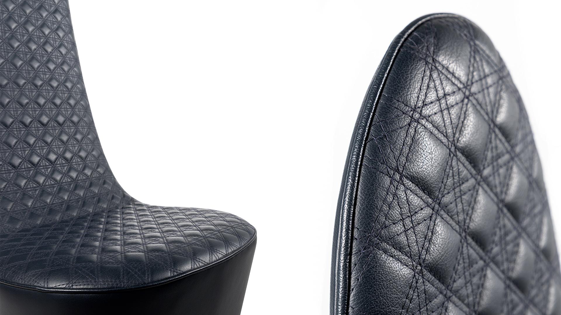 SWAN Upholstered high-back leather chair