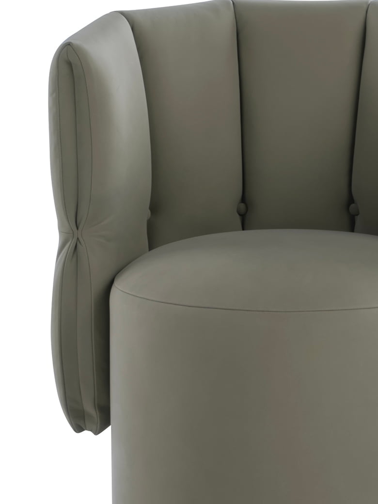 MADAME G Madame G chair blends Italian elegance with a universal tulip design, offering comfort, swivel functionality, and a unique 'Made in Italy' statement piece for any space.