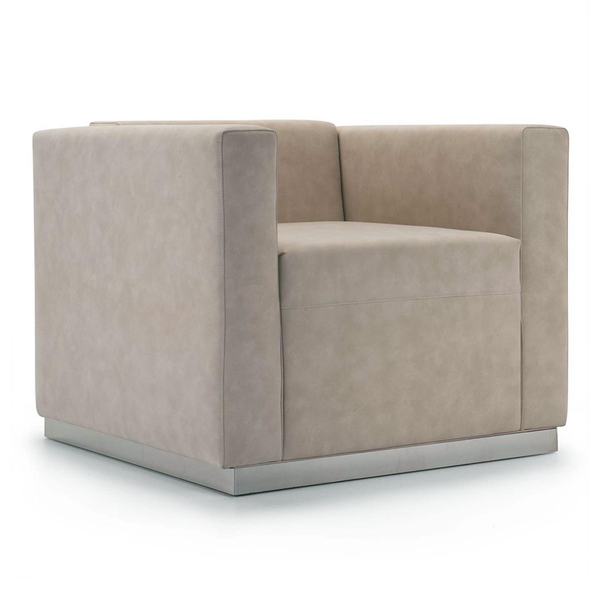 QUINCY Upholstered leather armchair with armrests