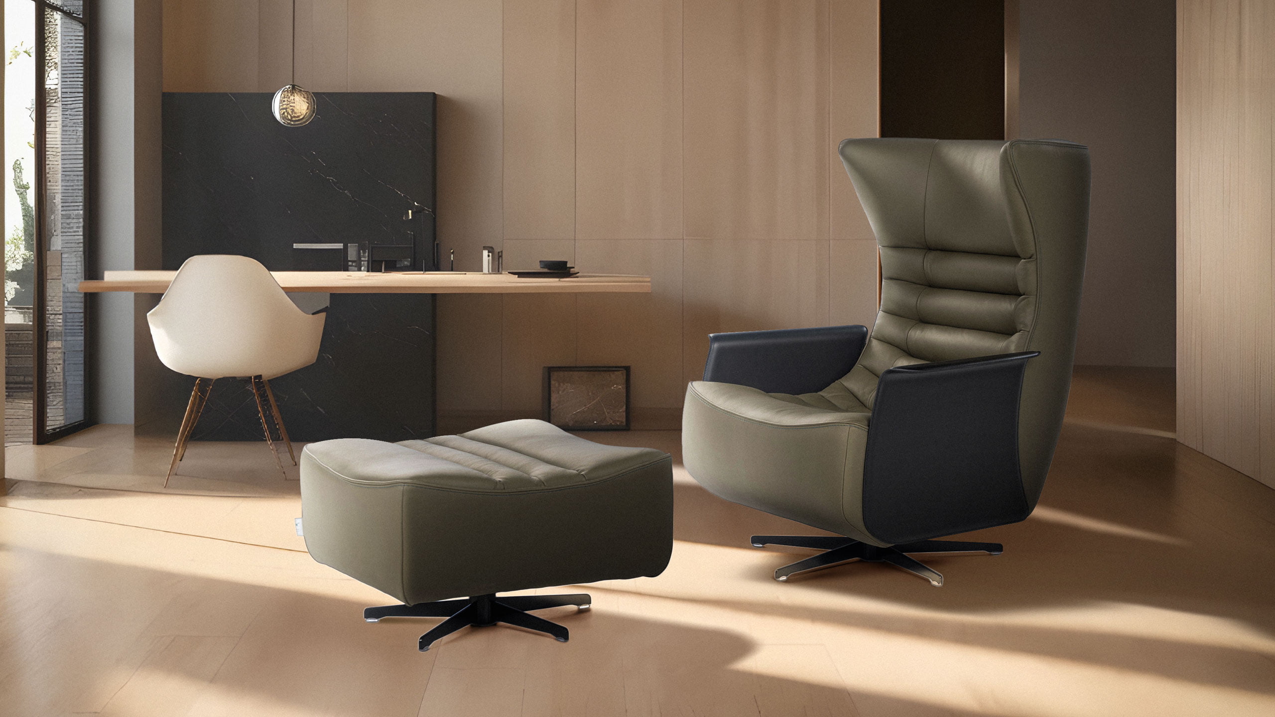 GERRIT The 'Gerrit' armchair is a comfortable, modern classic with quilting detail that extends to a matching footstool. Optional swivel base and customizable finishes cater to personal or office use.