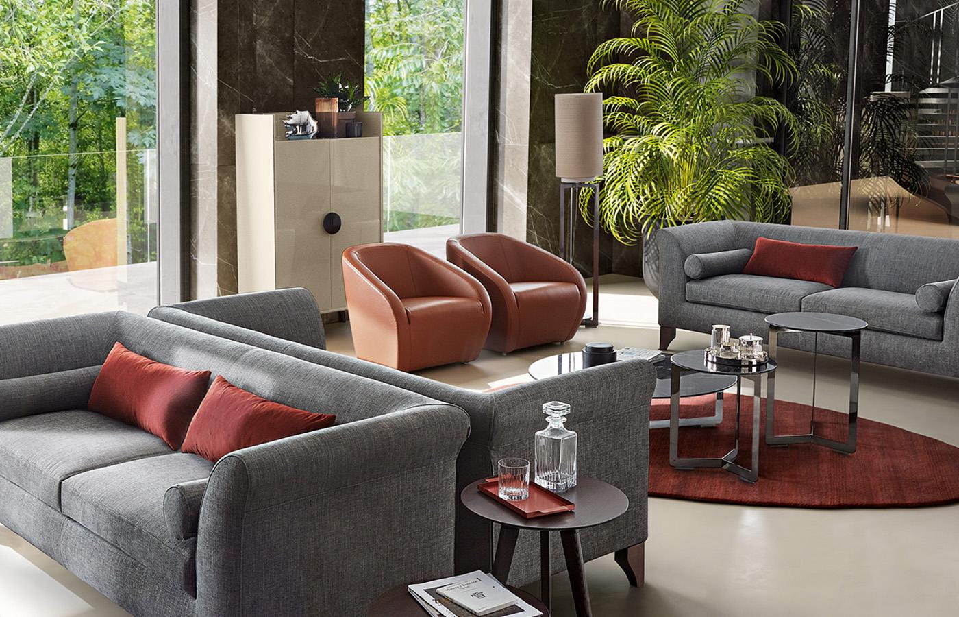 ARNOLD Leather armchair with armrests