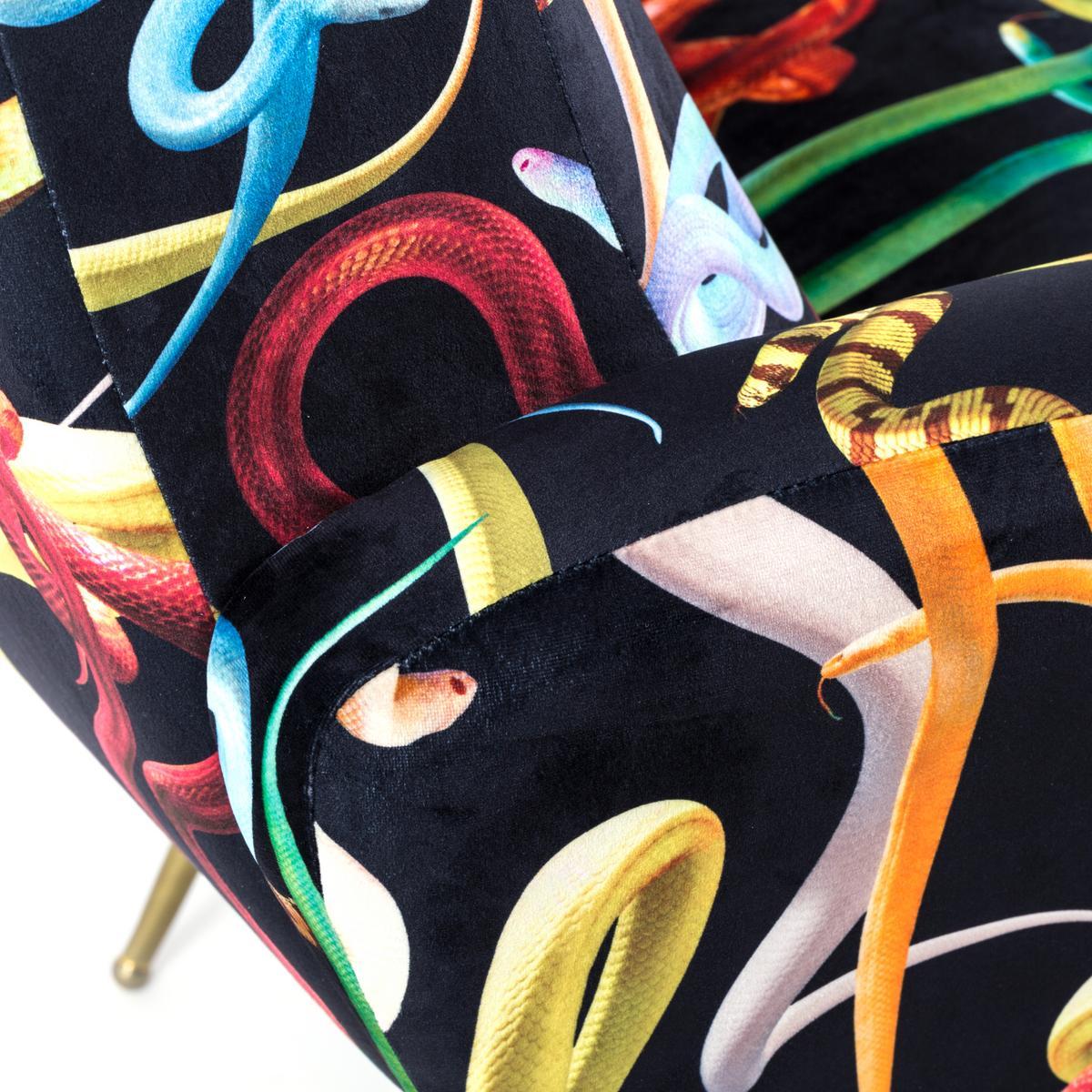 SNAKES Fabric armchair with armrests