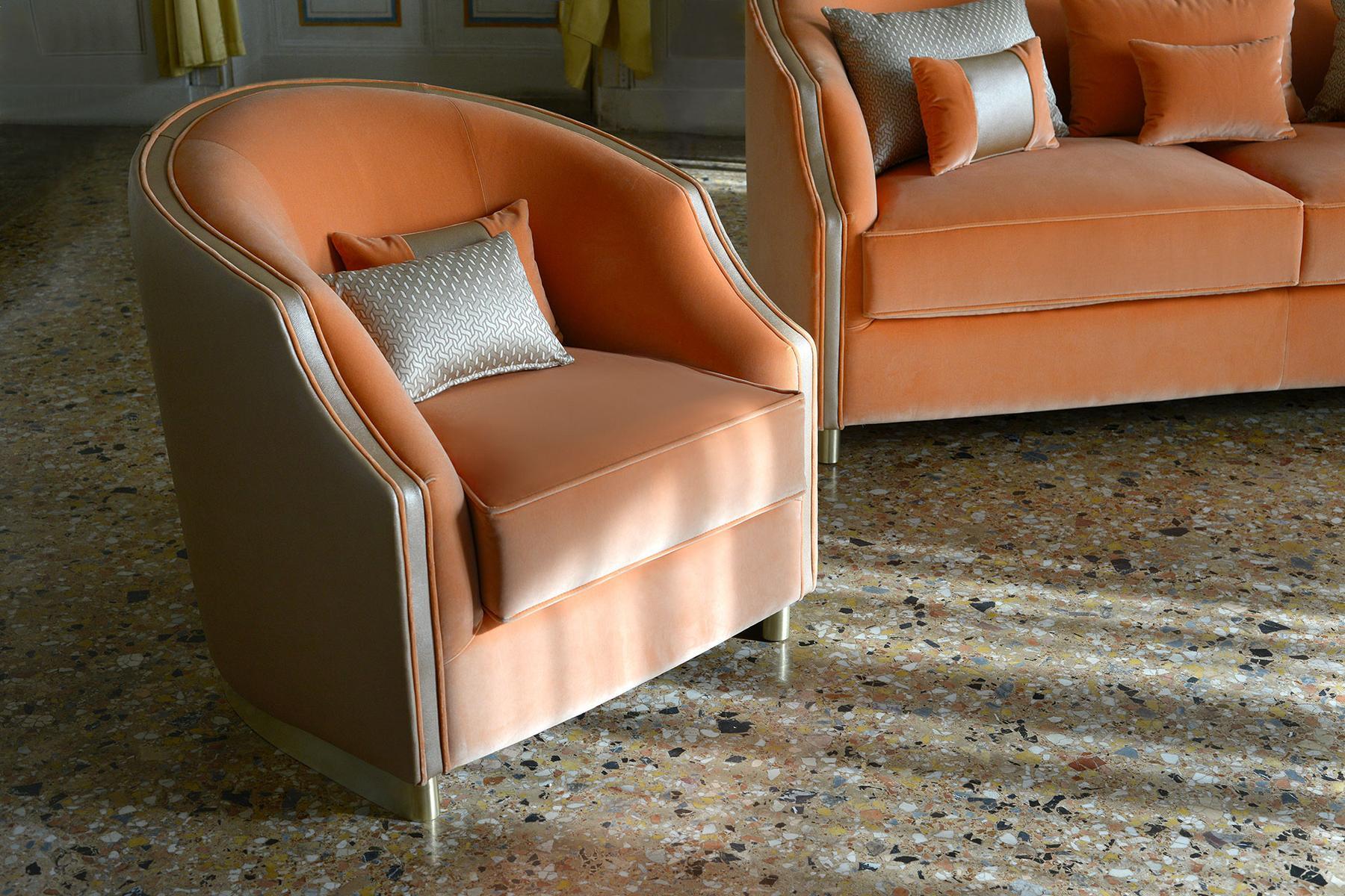 CLEIO Upholstered fabric armchair with armrests