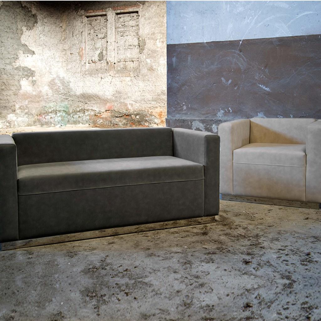 QUINCY Upholstered leather armchair with armrests
