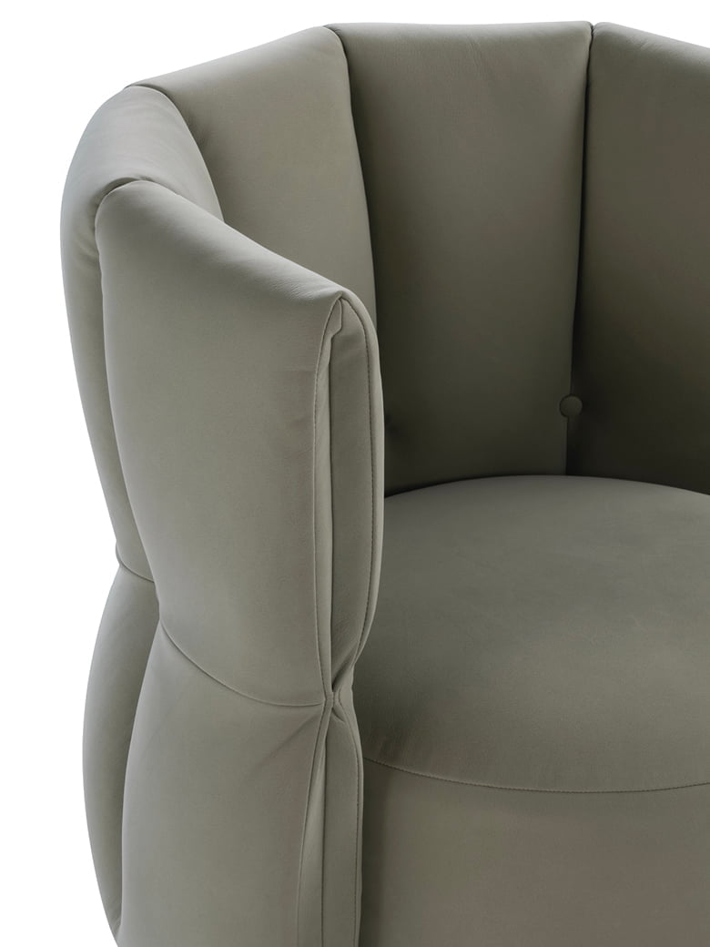 MADAME G Madame G chair blends Italian elegance with a universal tulip design, offering comfort, swivel functionality, and a unique 'Made in Italy' statement piece for any space.