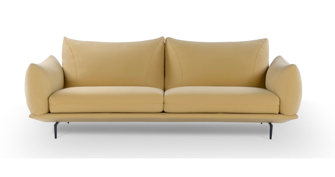 DRAGÉES Elegant sectional with heightened backrests for superior comfort, minimal base, and decorative stitching, combining sophistication with supported relaxation.