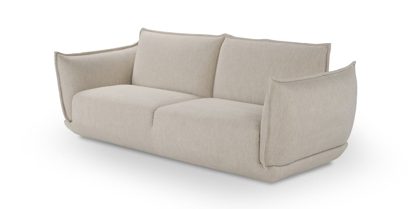 L'ECLAIR The Éclair sofa features an innovative design with sculptural volumes, decorative stitching, and comfortable seating, available in various sizes for modern and attractive interiors.