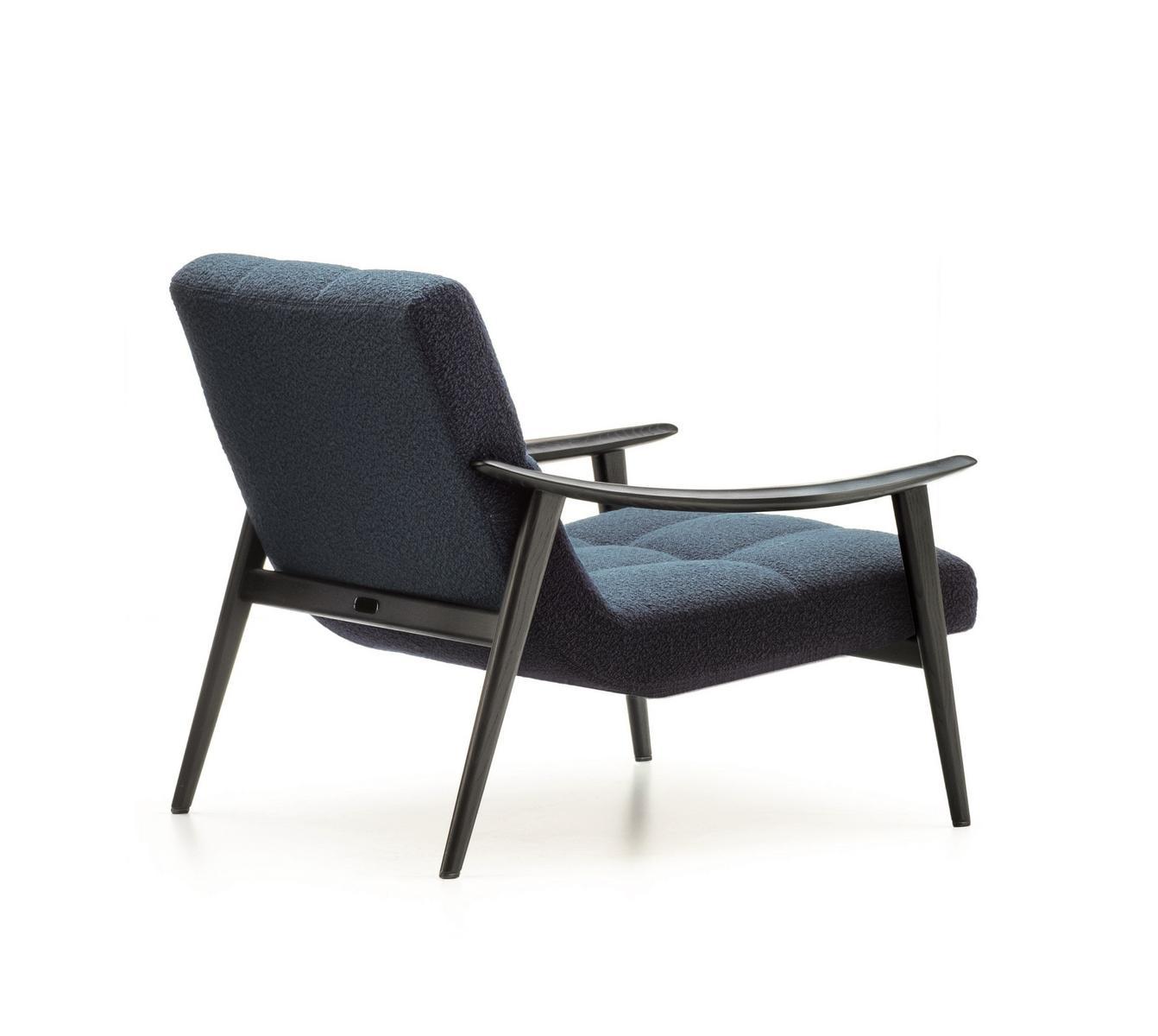 FYNN Upholstered armchair with armrests