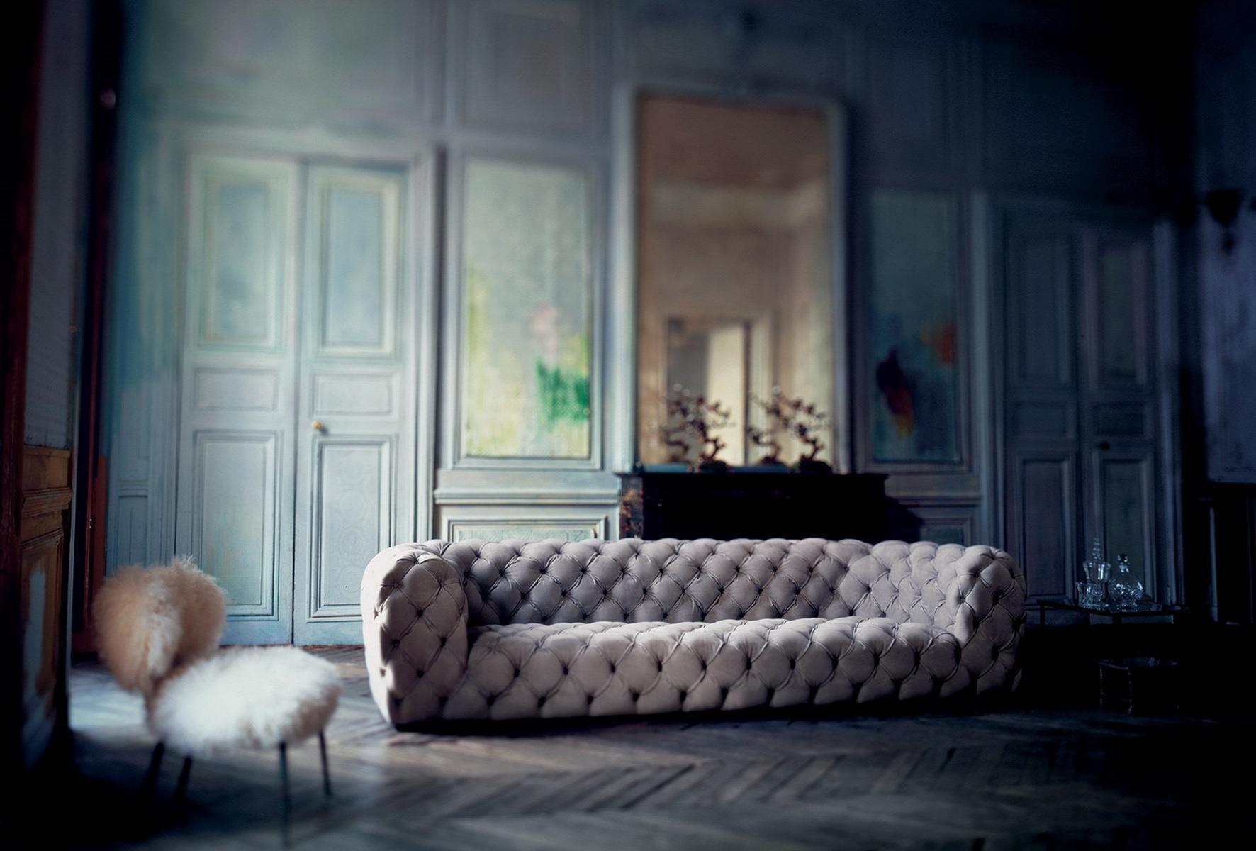 CHESTER MOON Tufted leather sofa