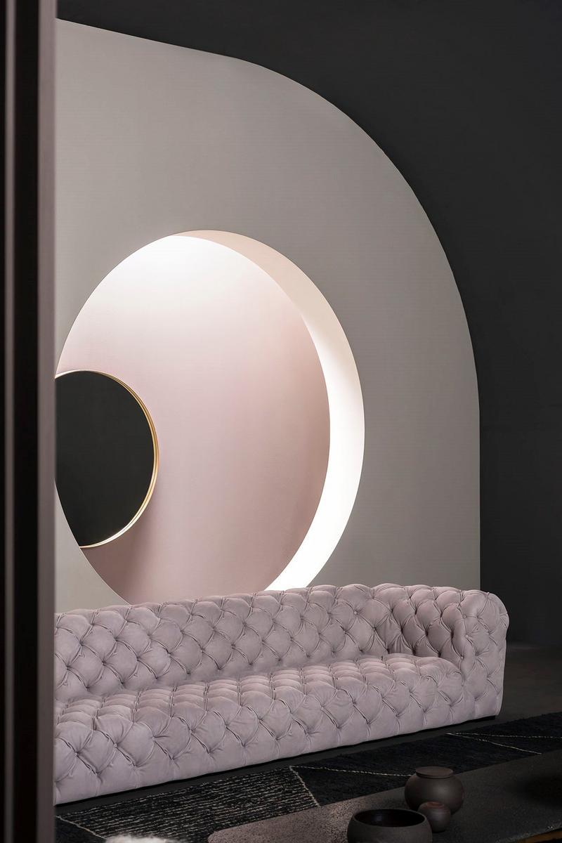 CHESTER MOON Tufted leather sofa