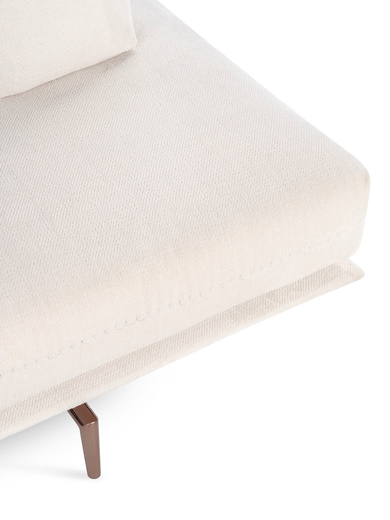 GIANDUIOTTO A versatile sofa offering adjustable backrests for multiple seating positions, elegant design stitching, and optional integrated table surfaces, elevated by stylish metal feet.