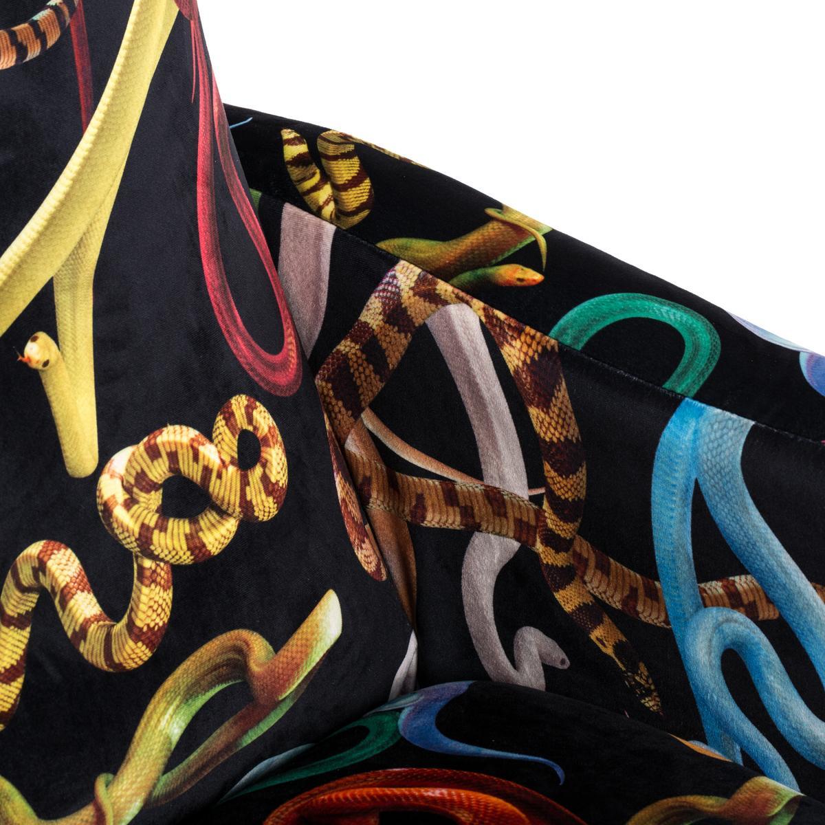 SNAKES Fabric armchair with armrests