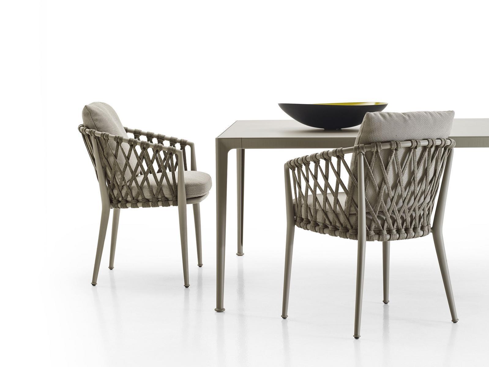 ERICA Upholstered fabric garden chair with armrests