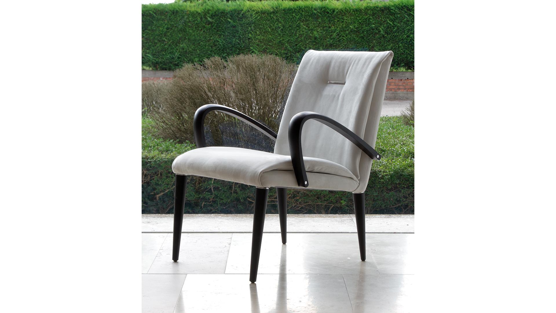 SOFT Upholstered leather easy chair with armrests