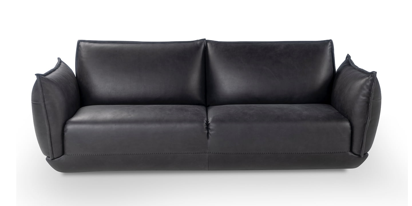 L'ECLAIR The Éclair sofa features an innovative design with sculptural volumes, decorative stitching, and comfortable seating, available in various sizes for modern and attractive interiors.