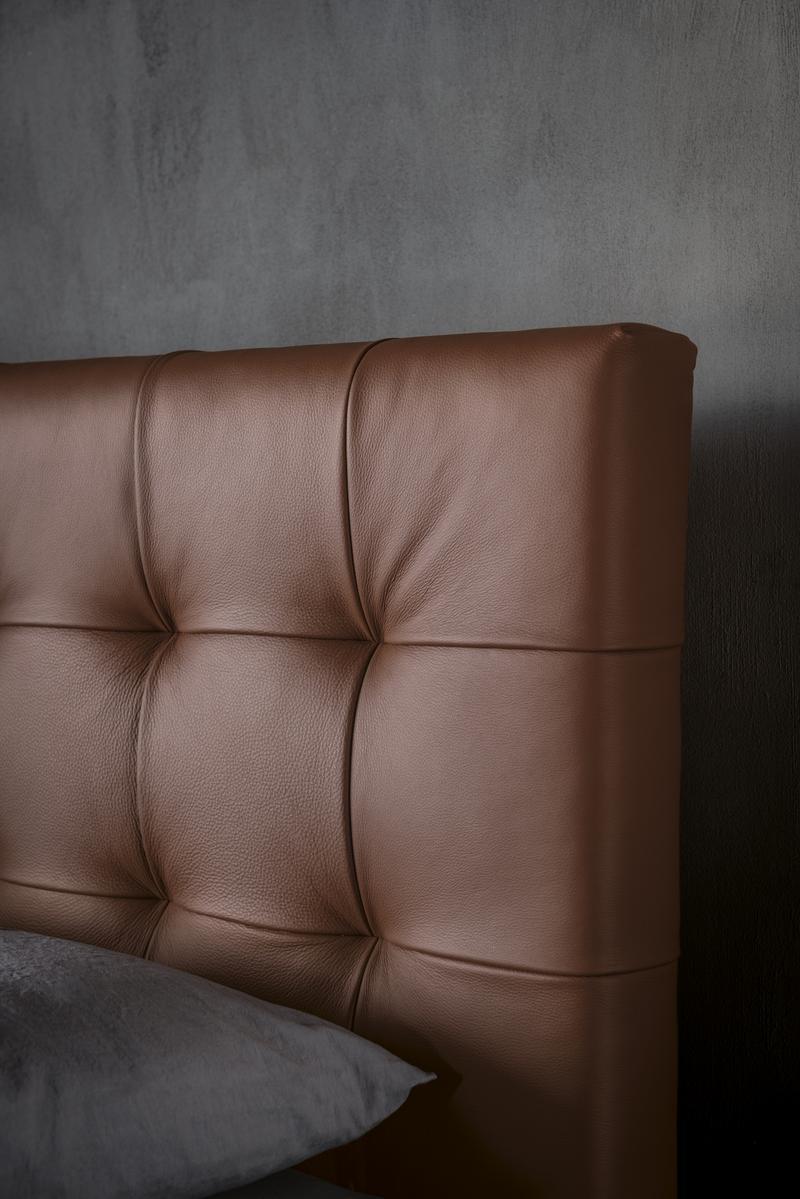 FREEDOM Storage bed with tufted headboard