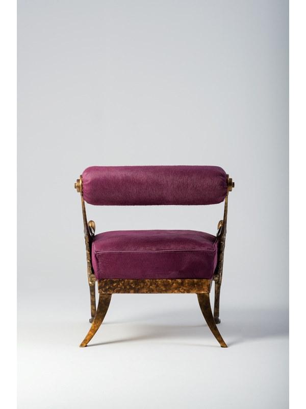 OVER Leather and bronze easy chair