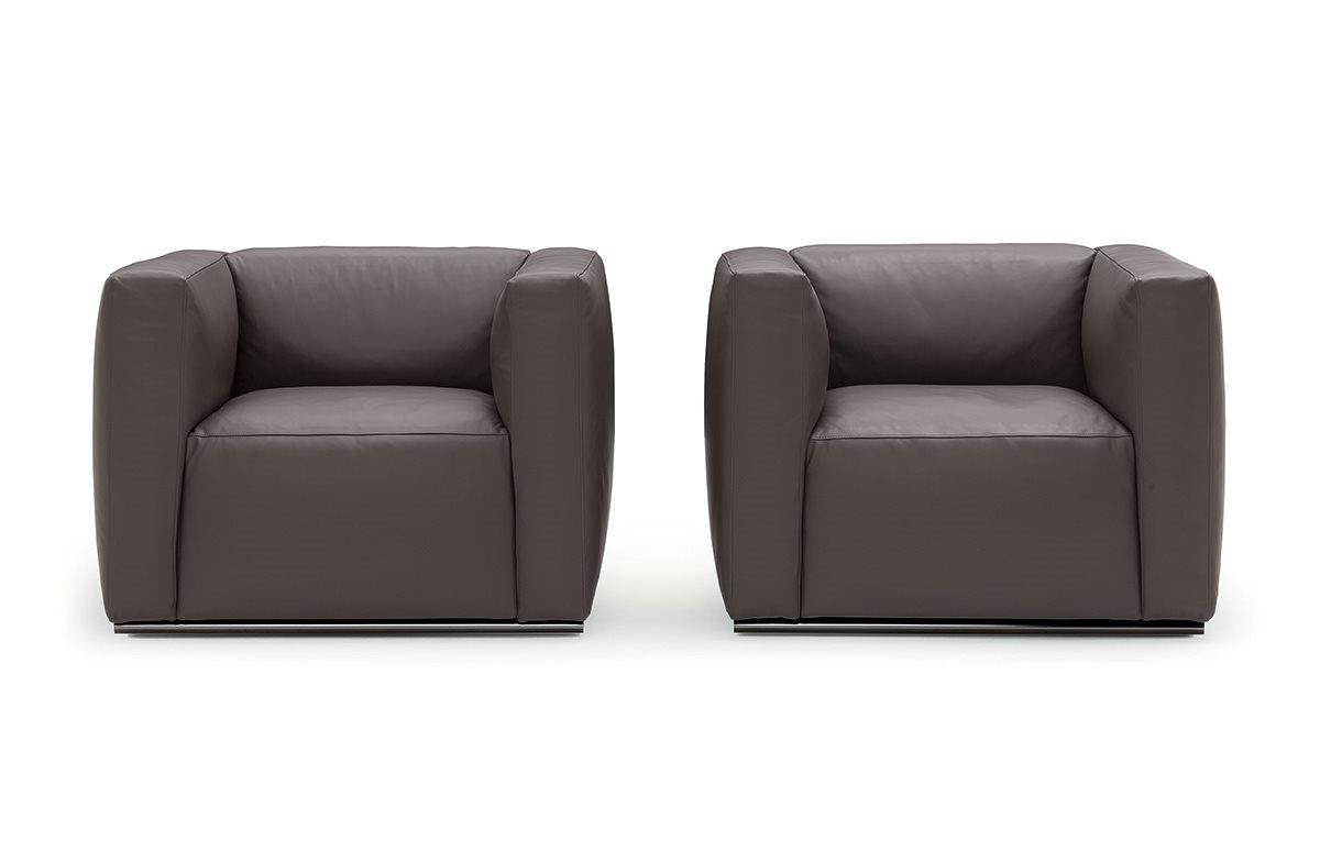 SHANGAI Upholstered leather armchair with armrests
