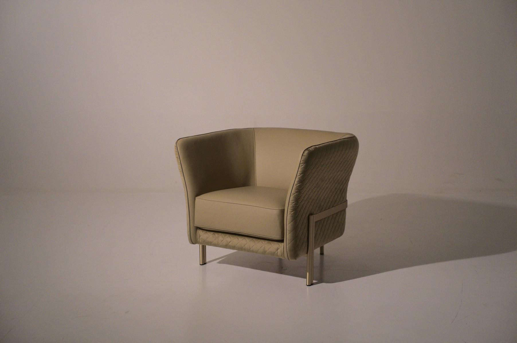 UNIVERSAL Fabric armchair with armrests