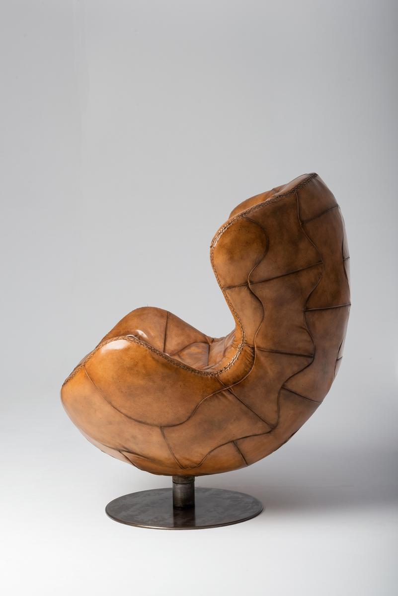 PELÈ Swivel leather armchair with armrests