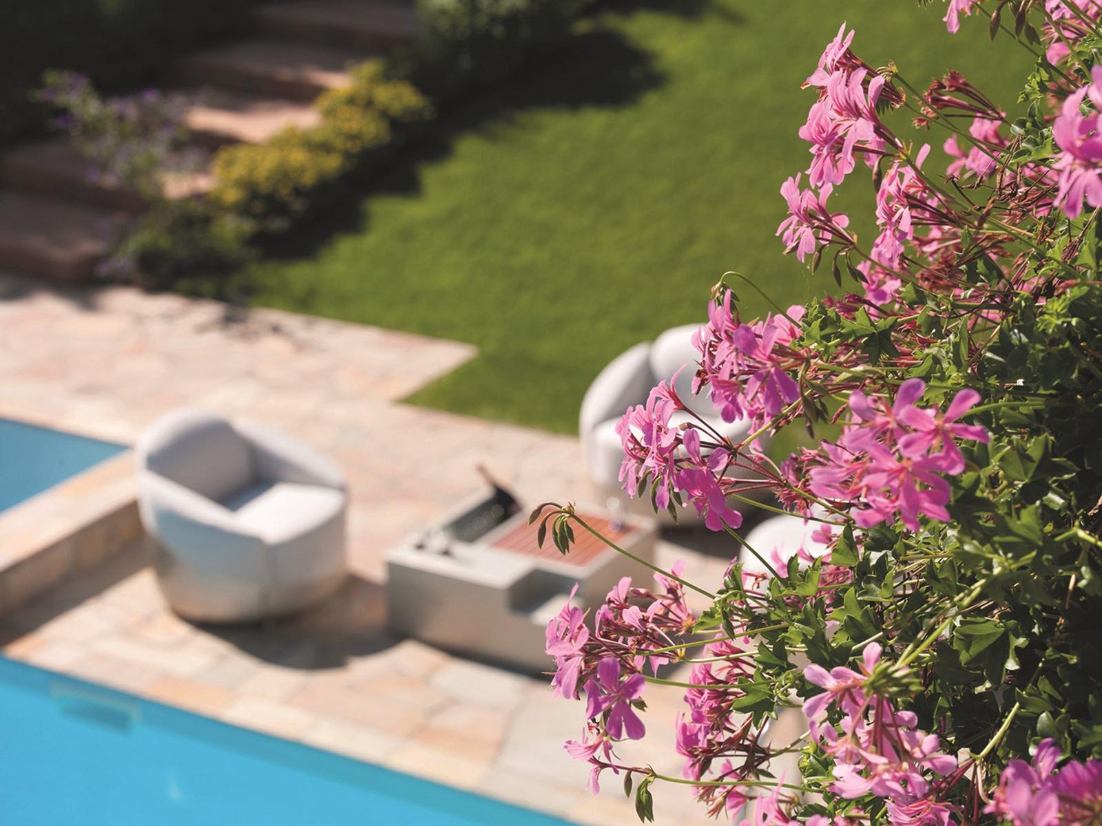 ASTREA Fabric outdoor armchair