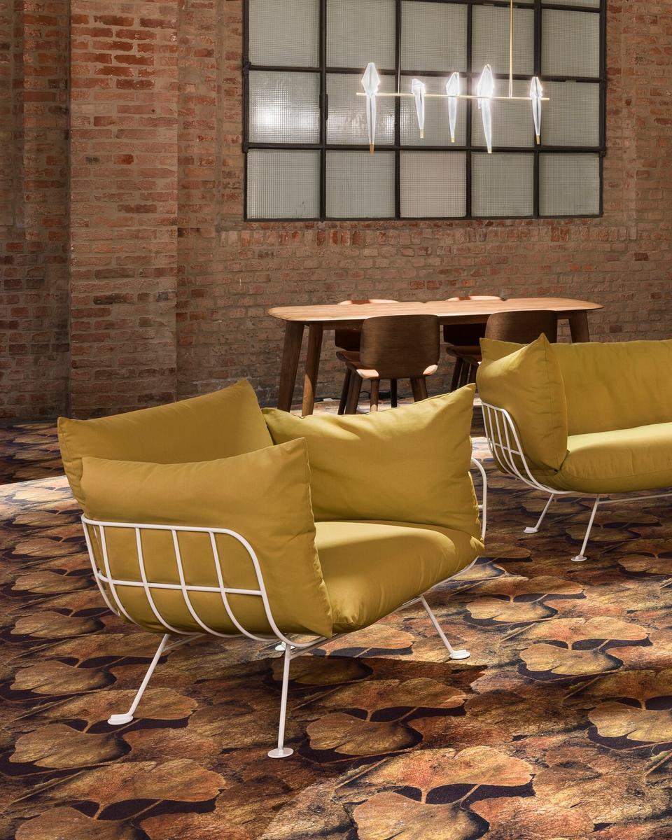 NEST Upholstered armchair with armrests