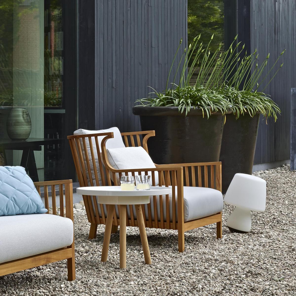 ELIZABETH TECK Upholstered teak garden armchair with armrests