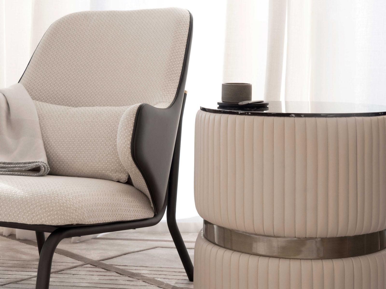 DIVA Upholstered fabric armchair with headrest