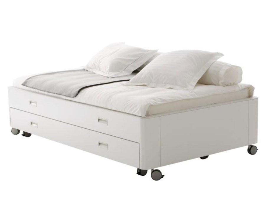TRAVEL STUDIO Wooden storage bed on castors