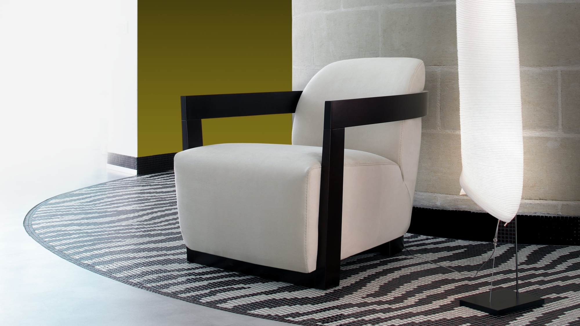GRAND HOTEL Elegant Grand Hotel armchair, timeless design, highly comfortable, fits any decor, customizable beech wood finishes, simple yet sophisticated lines.